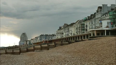 Time lapse dramatic clouds over Hastings seafront in England 4K Video stock 285768405