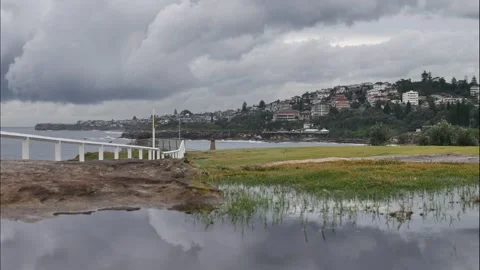Time lapse dramatic clouds reflected at Coogee Sydney 4K Stock Footage 274868472