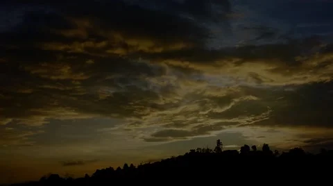 Time lapse of dramatic colorful dusk sky over the hill. Stock Footage 59170988