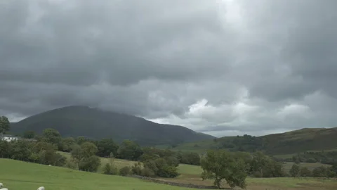 Time lapse. Dramatic landscape of the British countryside in summer. Stock Footage 254843462