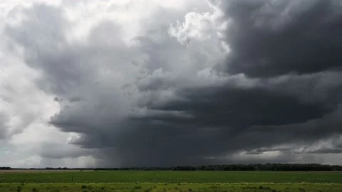 Time lapse of dramatic rain storm clouds are moving towards the viewer  Stock Footage 233115869