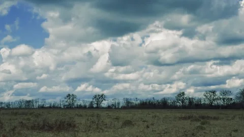 Time lapse of dramatic scenic cloudscape with beautiful cumulus clouds moving in Stock Footage 238034593