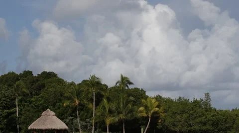 A time lapse of dramatic storm clouds developing over an island Stock Footage 53418790