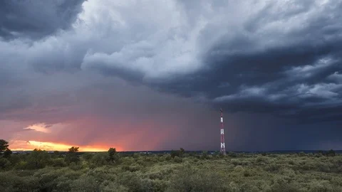 Time lapse of a dramatic storm clouds at sunset Stock Footage 110074917