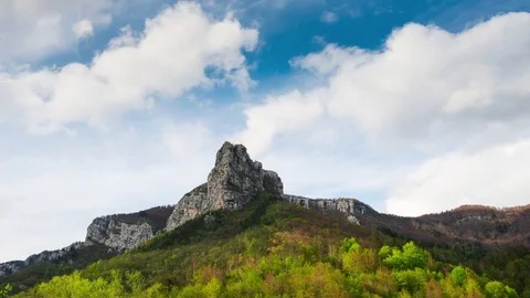 Time lapse of drifting clouds over the hill in spring, Croatia. Stock Footage 83360513