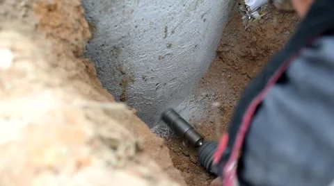 Time lapse of drilling a hole in concrete well Stock Footage 68329353