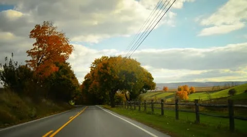 Time lapse of a drive through a hilly twisty road during glorious fall Stock Footage 20455921