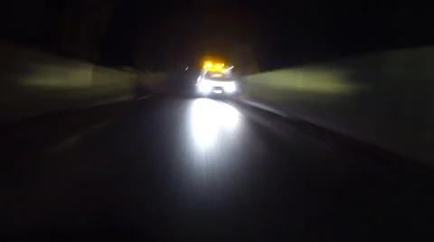 Time lapse. Driving along an English country road at night. UK Stock Footage