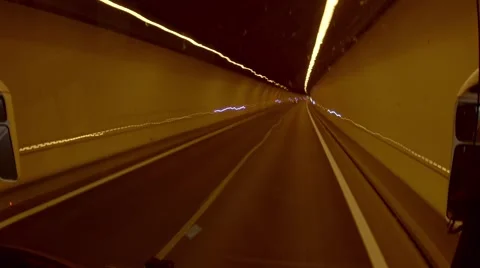 Time lapse driving along the orange tunnel at night  Stock Footage 68945226