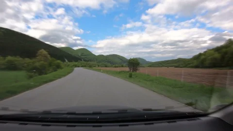 Time lapse of driving car in spring rural country road Hyper lapse Stock Footage 107864806
