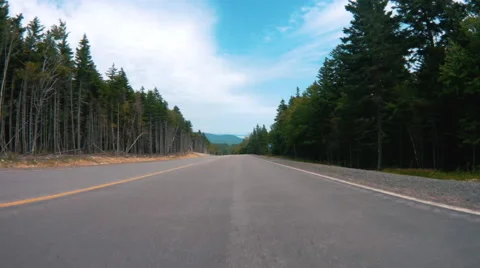 Time Lapse of Driving Down Winding Rural Road to Ocean. 動画素材 65129975