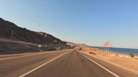 Time lapse of driving on empty coastal highway in the desert Stock Footage 340868951