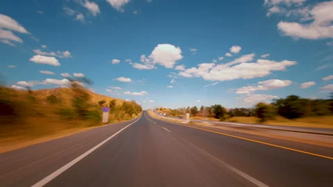 Time-lapse of driving fast speed a car on road Stock Footage 134365264