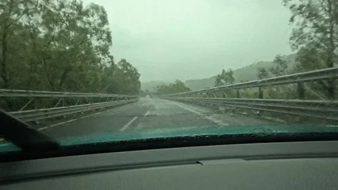 Time lapse driving in the rain along a Sicilian highway Stock Footage 310212370