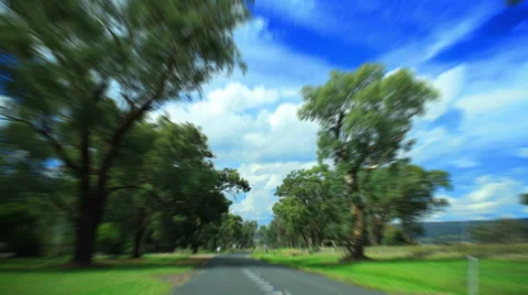Time lapse driving on the road along forest and fields Stock Footage 46414718