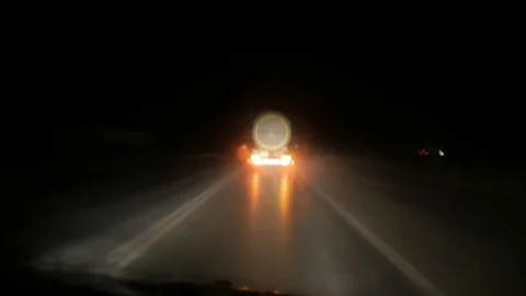Time lapse of driving on  road at night, view of the road from the car. Video stock 128485866