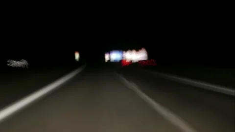 Time lapse, of driving on  road at night, view of the road from the car. Stock Footage 130866565