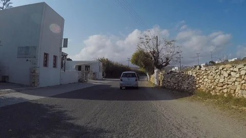 Time Lapse of Driving Through the Picturesque Streets of Paros on a Sunny Day Stock Footage 101207993