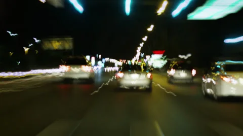Time lapse of driving through traffic at night Vídeo Stock 29158360