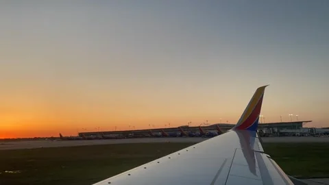 Time Lapse During Take Off at Sunset Stock Footage 247529090