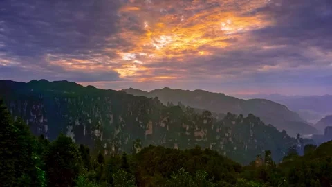 Time Lapse of Dusk Golden Glow Peculiar Peak Canyon Forest Stock Footage 337930646