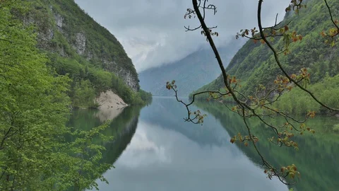 Time Lapse  Early in the morning. Clouds reflected on a lagoon Stock Footage 127885489