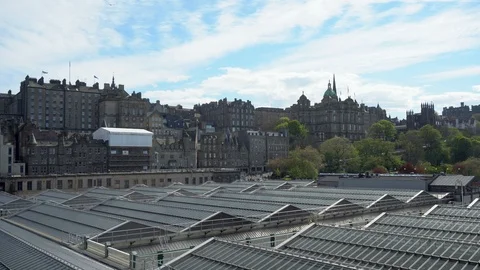 Time Lapse of Edinburgh Old Town Skyline and Glass Roof of Waverley Station Stock Footage 119106930