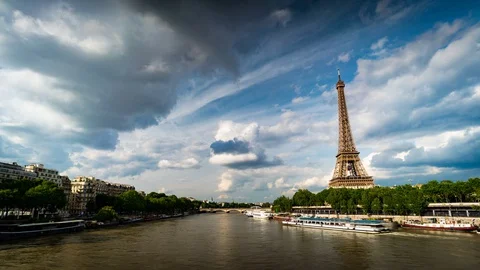 Time-lapse of the Eiffel Tower and the Seine Stock Footage 129384962
