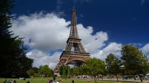 Time lapse of the Eiffel tower with clouds on a sunny day. Stock Footage 68381738