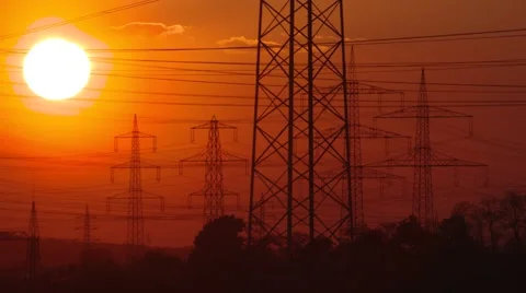 TIME LAPSE: Electrical power supply (electrical towers) with sunset in red sky Stock Footage 64471083