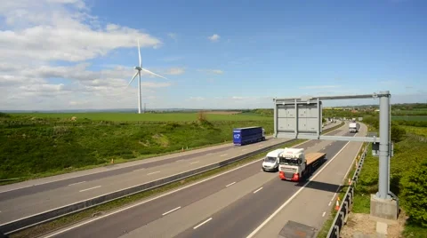 Time lapse electricity generating windmills by m18 motorway sheffield uk Stock Footage 49988816
