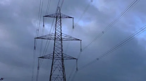 Time Lapse of Electricity Pylon &amp; clouds moving past Stock Footage 44780205