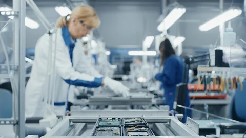 Time Lapse of Electronics Factory Workers Assembling Smartphone Circuit Boards Video stock 98727770