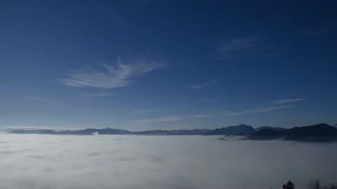 Time lapse elevated view of inversion clouds moving in the valley Stock Footage 147729715