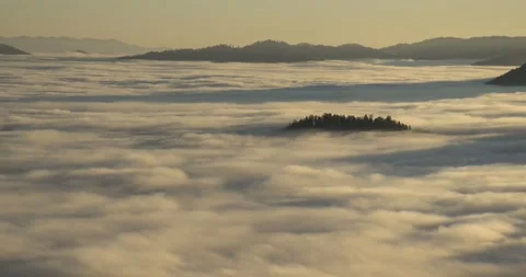 Time lapse elevated view of low cloud inversion Stock Footage 144008137