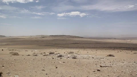 Time-lapse of empty desert landscape with blue sky, Kolmanskop Stock Footage 143341974