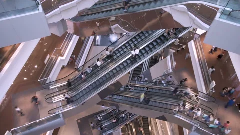 Time lapse escalators in modern shopping mall crowd of people. Consumption Stock Footage 116654477