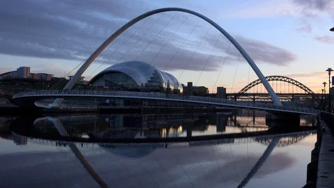 Time lapse evening light Newcastle upon Tyne bridges across the Tyne river UK 4K Stock Footage 105353481