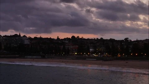 Time lapse evening to night clouds over Sydneys Coogee beach 4K Video stock 272844742