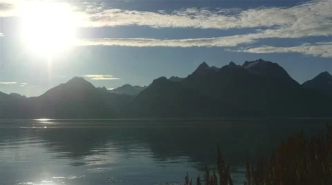 Time-lapse of a evening at the sea, with a sunset view of a lofoten mountain, Stock Footage 68599871