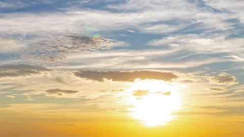 Time lapse of evening sky from bright sun to sunset and to dusk Stock Footage 246881899