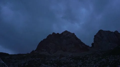 Time lapse evening view of High Grey Mountain with Background flying clouds Stock Footage 252267022