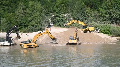 Time lapse excavators working at river construction site Stock Footage 136408805