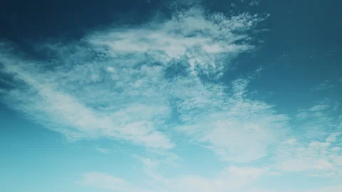 Time lapse. Experience the Vast Blue Sky and Wispy Clouds Relish Tranquil Moment Stock Footage 311308758