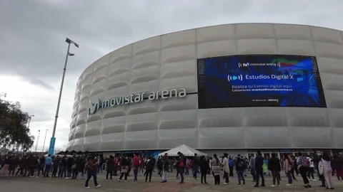 Time lapse facade of Movistar Arena coliseum concert hall during vaccination day Stock Footage 156582245
