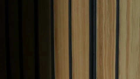 Time-lapse, falling light from the window on the bookshelf. Stock Footage 170386575