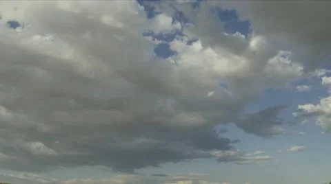 Time lapse of fast building beautiful clouds Stock Footage 64983326