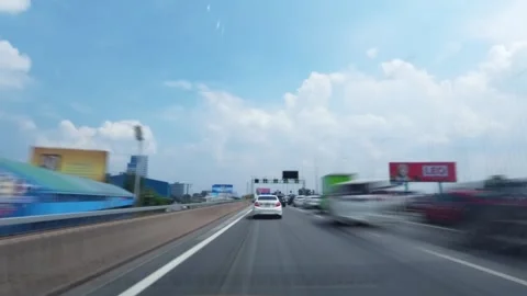 Time lapse fast driving on the Bangkok city highway in the traffic flow. View Video stock 289054368