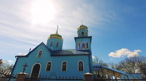 Time lapse. Fast moving clouds in the background of the Orthodox Church. Stock Footage 64655699