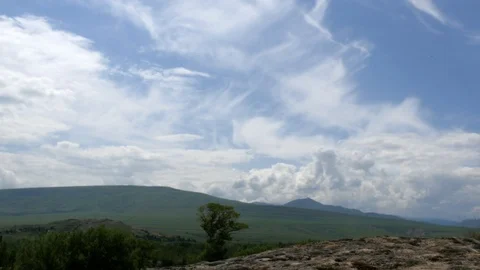Time lapse, fast-moving clouds over the valley , Georgia Stock Footage 90350175